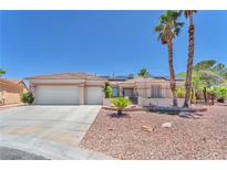 Charming single-story home featuring a three-car garage and low-maintenance desert landscaping at 1596 Fieldbrook St, Henderson, NV 89052