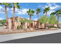 Charming single-story home featuring meticulously landscaped front yard and desert-friendly landscaping at 5192 Estasi St, Las Vegas, NV 89135