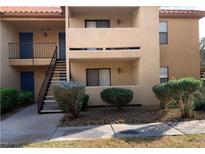 Multi-level condo with private balconies and exterior stairs offering convenient access to each unit at 3135 S Mojave Rd # 152, Las Vegas, NV 89121