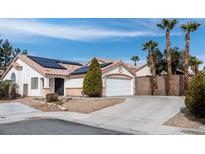 Charming single-story home featuring a red tile roof, solar panels, and a two-car garage at 3643 Spring Willow Ct, Las Vegas, NV 89147