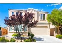 Charming two-story home featuring a landscaped yard and a two-car garage at 9746 Brooks Lake Ave, Las Vegas, NV 89148