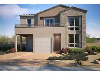 Charming two-story home featuring a stone facade, a balcony, two garages, and a well-manicured front yard at 1785 Flycatch St, Las Vegas, NV 89138