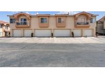 Attractive townhouse complex featuring balconies and attached garages at 5000 Red Rock St # 241, Las Vegas, NV 89118