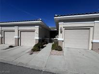 Inviting single-story home featuring a private drive and an attached single-car garage at 2270 Canyon Song Ave, Laughlin, NV 89029