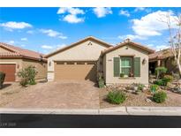 Charming single-story home with a well-manicured yard and a two-car garage at 7832 Hamilton Pool Dr, Las Vegas, NV 89113