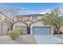 Charming two-story home with stucco and a two-car garage in a suburban neighborhood at 2169 Haypenny Ct, Las Vegas, NV 89123