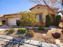 Charming single-story home featuring a well-maintained xeriscaped front yard at 7433 Cleghorn Canyon Way, Las Vegas, NV 89113
