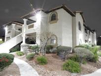 Inviting multi-story condo with a well-maintained yard and charming desert landscaping at 1403 Santa Margarita St # D, Las Vegas, NV 89146