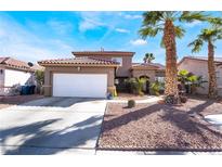 Inviting single-Gathering home with a well-maintained front yard and desert landscaping at 1893 Donnington Ct, Las Vegas, NV 89123