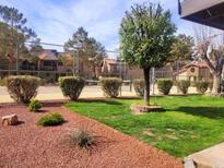 Well-maintained community tennis court and landscaping, creating a tranquil atmosphere for residents and visitors at 4019 Delos Dr, Las Vegas, NV 89103