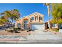 Charming two-story home featuring a well-maintained yard and a two-car garage at 7337 Tealwood St, Las Vegas, NV 89131