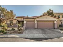 Charming single-story home featuring a well-maintained yard and a three-car garage at 9262 Edgeworth Pl, Las Vegas, NV 89123