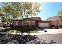 Charming single story home featuring a two car garage, well-maintained landscaping, and classic architecture at 10475 Rose Park Ave, Las Vegas, NV 89135