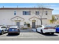 Charming townhome with covered entryways and ample parking spaces for residents and visitors at 10087 Aspen Rose St # 102, Las Vegas, NV 89183