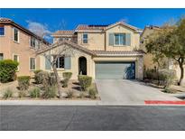 Charming two-story home with a well-maintained front yard and attached two-car garage, complete with desert landscaping at 5652 Nobleton Ct, North Las Vegas, NV 89081