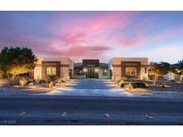 Stunning single-story home with modern desert landscaping and excellent curb appeal under a lovely sunset at 7966 W Ford Ave, Las Vegas, NV 89113