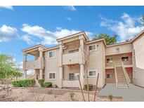Charming apartment complex featuring multiple units, balconies and well-maintained grounds at 1807 Rapier Dr # 1807, Henderson, NV 89014