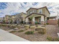 Charming two-story home with desert landscaping and covered entry at 3177 Bivona Walk, Henderson, NV 89044