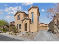 Charming two-story home showcasing a stucco exterior, red tile roof, and well-maintained landscaping at 11060 Magenta Crest Ct, Henderson, NV 89052