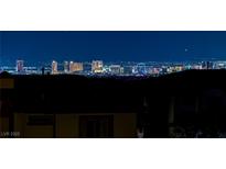 Enjoy stunning Las Vegas Strip views from this beautiful home at night at 180 Native Stone St, Las Vegas, NV 89138