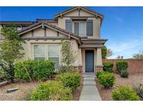 Charming two-story home with a landscaped front yard and inviting entrance at 10247 Gladstone Peak St, Las Vegas, NV 89166