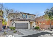 Charming two-story home featuring a two-car garage and desert landscaping at 11226 Jewel Desert Ct, Las Vegas, NV 89179