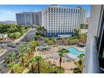 Resort-style pool area featuring a gazebo, lounge chairs, and lush landscaping at 322 Karen Ave # 703, Las Vegas, NV 89109