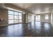 Bright living room with hardwood floors and large windows offering city views at 150 N Las Vegas Blvd # 804, Las Vegas, NV 89101