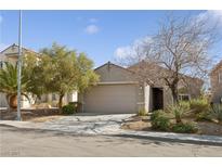 Inviting single-Gathering home with desert landscaping, a two-car garage, and a neutral-toned exterior at 2839 Strathallan Ave, Henderson, NV 89044