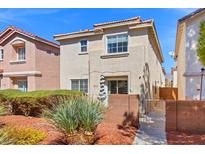 Charming two-story home features a well-maintained front yard and gated entrance at 3023 Sunrise Bay Ave, North Las Vegas, NV 89031