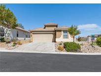 Charming single-story home featuring a two-car garage and low-maintenance desert landscaping at 4016 Balsam Mountain St, Las Vegas, NV 89129