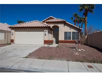Charming single-story home featuring a two-car garage and low-maintenance landscaping at 5200 Brookmere Dr, Las Vegas, NV 89130