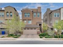 Charming two-story home with a two-car garage and well-manicured landscaping at 105 Campbelltown Ave, Henderson, NV 89015