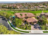 Beautiful two-story home with lush landscaping and a view of the golf course at 2994 San Lorenzo Ct, Henderson, NV 89052