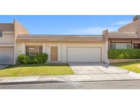 Charming single-story home featuring a two-car garage and well-maintained front yard at 3345 Medina Ct, Las Vegas, NV 89121