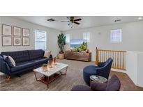 Inviting living room with modern decor and a cozy seating area, perfect for relaxation at 470 Dorchester Bend Ave # 3, North Las Vegas, NV 89032