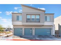 Modern two-story home featuring three car garage and neutral color palette at 4915 Chidlaw Ave # 2, Las Vegas, NV 89115