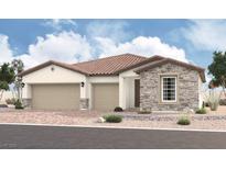 Charming single-story home featuring a stone facade, clay tile roof, and a spacious two-car garage at 5707 E Victoria Falls Dr, Pahrump, NV 89061