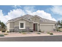 Charming single-story home features a stone veneer, neutral paint, tile roof, and a well-manicured desert landscape at 5753 E Badlands Ln, Pahrump, NV 89061