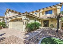 Charming two-story home with a well-maintained yard and a two-car garage at 10900 Calcedonian St, Las Vegas, NV 89141
