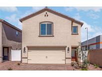 Charming two-story home with a two-car garage, landscaped yard, and neutral stucco finish at 6215 Blood Lily Ave, Las Vegas, NV 89122