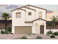 Charming two-story home features a stucco exterior, two-car garage, and desert landscaping with palm trees at 9933 Ruby Dome Ave, Las Vegas, NV 89178