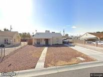 Charming single-story home featuring low-maintenance landscaping and a cozy front porch at 110 Palm Ln, Las Vegas, NV 89101