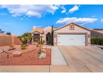 Charming single-story home with desert landscaping and two-car garage at 420 Aloha Dr, Henderson, NV 89015