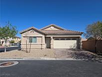 Charming single-story home with a well-maintained front yard and a two-car garage with a brick driveway at 4708 Salutations Ave, Las Vegas, NV 89139