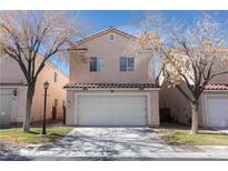 Charming two-story home with a well-maintained front yard and a two-car garage at 5461 Dungaree St, Las Vegas, NV 89118