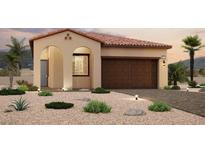 Charming single-story home featuring a tile roof, arched entryway, and low-maintenance desert landscaping at 820 Weston Ridge St, Henderson, NV 89011