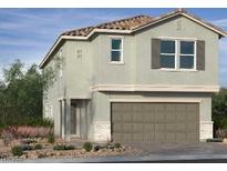Charming two-story home features a two-car garage, neutral color palette, and a beautifully landscaped front yard at 9141 Eagle Ford St, Las Vegas, NV 89113