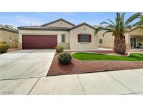 Charming single-story home with a well-manicured lawn and desert landscaping at 1313 Andrew David Ave, North Las Vegas, NV 89086
