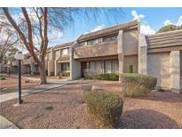 Charming townhome with a well-manicured front yard and desert landscaping at 3365 Zephyr Ct, Las Vegas, NV 89121